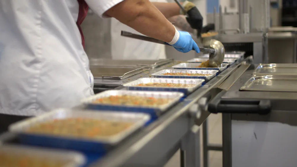 Prepared meal trays on a production line